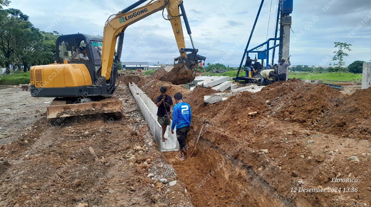 penggunaan excavator untuk proyek